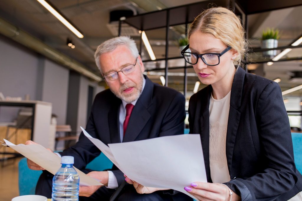 Retail manager analysing cost strategies